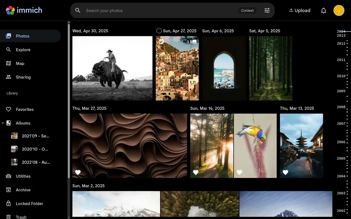 Immich’s public demo: a photo timeline with albums, search and a map.